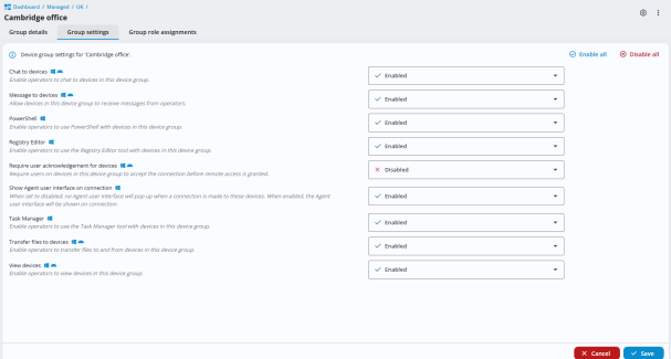 Device group settings page for the Cambridge office. A list of features such as chat, PowerShell, Registry Editor and Task Manager are shown, with drop-downs set to either Enabled or Disabled. All features are enabled except Require user acknowledgement for devices, which is disabled. Enable all and Disable all icons are in the top right and Cancel and Save buttons appear at the bottom.